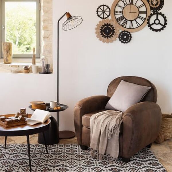 Découvrez notre avis expert sur le fauteuil club Stanis au charme intemporel, imitation cuir vieilli signée Atmosphera : confort et style pour votre intérieur